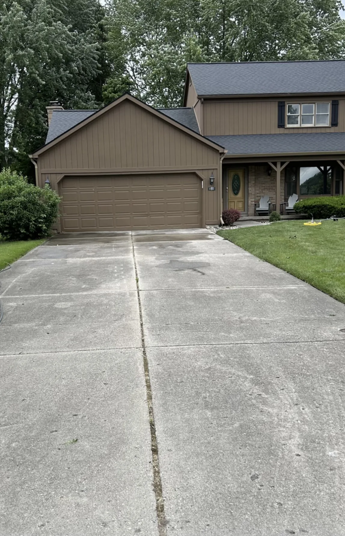 Concrete driveway before professional cleaning